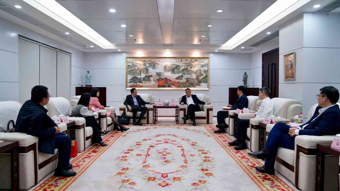 喻鸿会见华泰联合证券华南二部执行总经理王欣磊